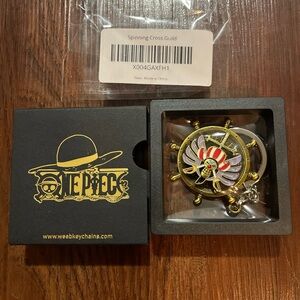 One Piece Spinning Cross Guild Keychain